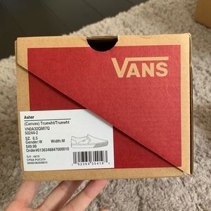 Size 6.5 women’s white slip on vans